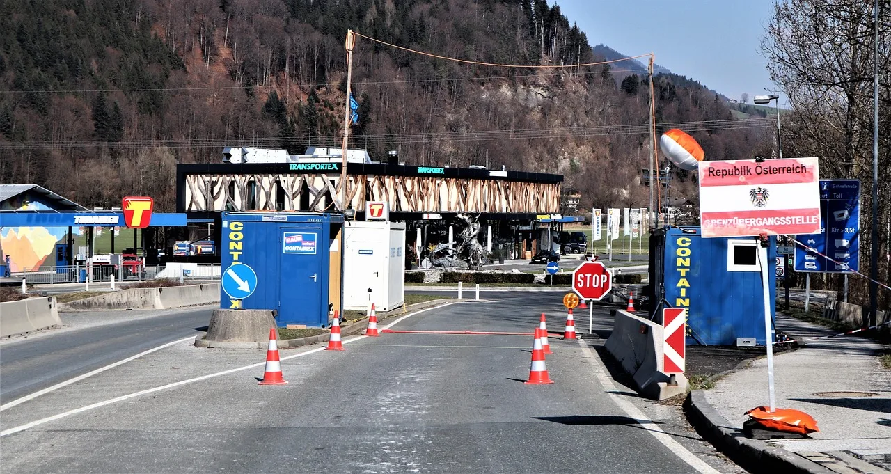 An automated border control gate with a facial camera, fingerprint scanner and passport reader